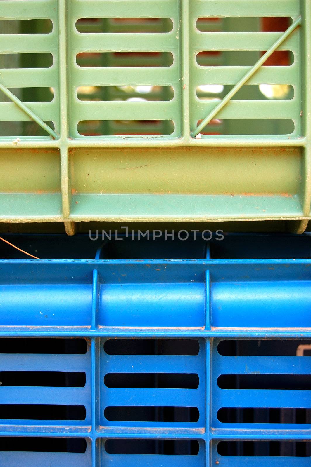 Plastic crates. Fruit packing container background detail.