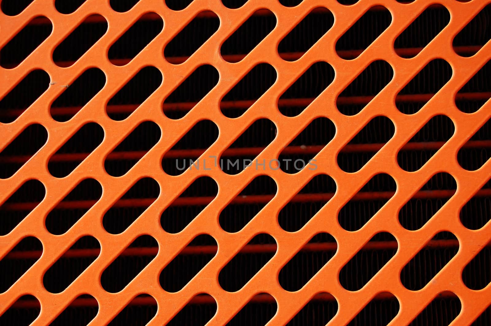Metal radiator grill detail. Industrial pattern background.