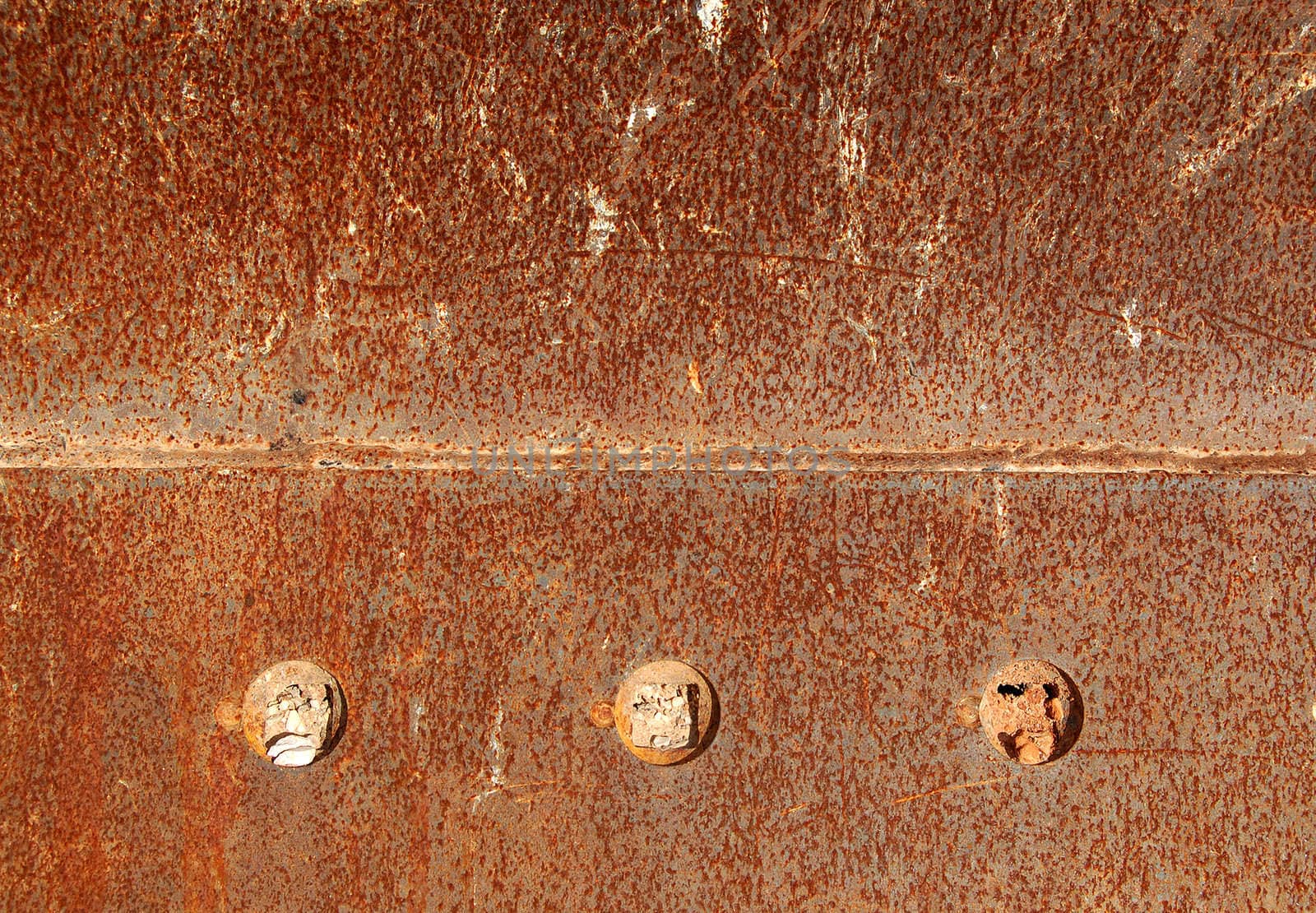 Rusty metal bolts. Industrial background texture.