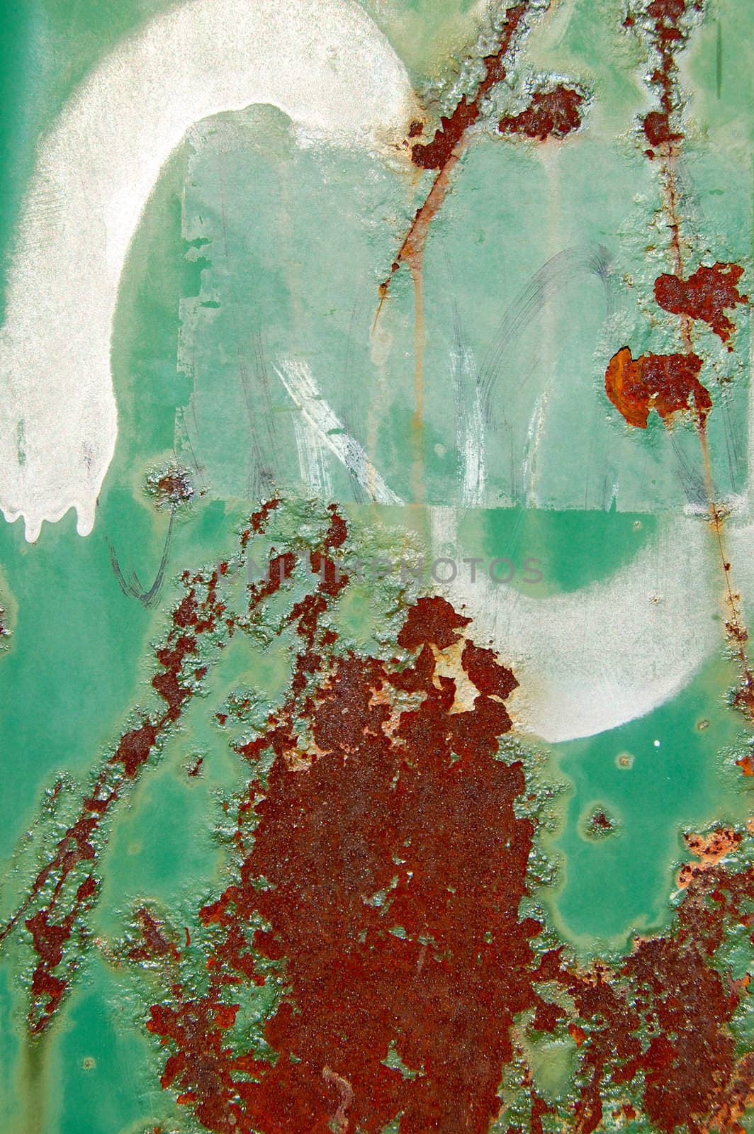 Rusty texture with peeling paint and graffiti. Abstract background.