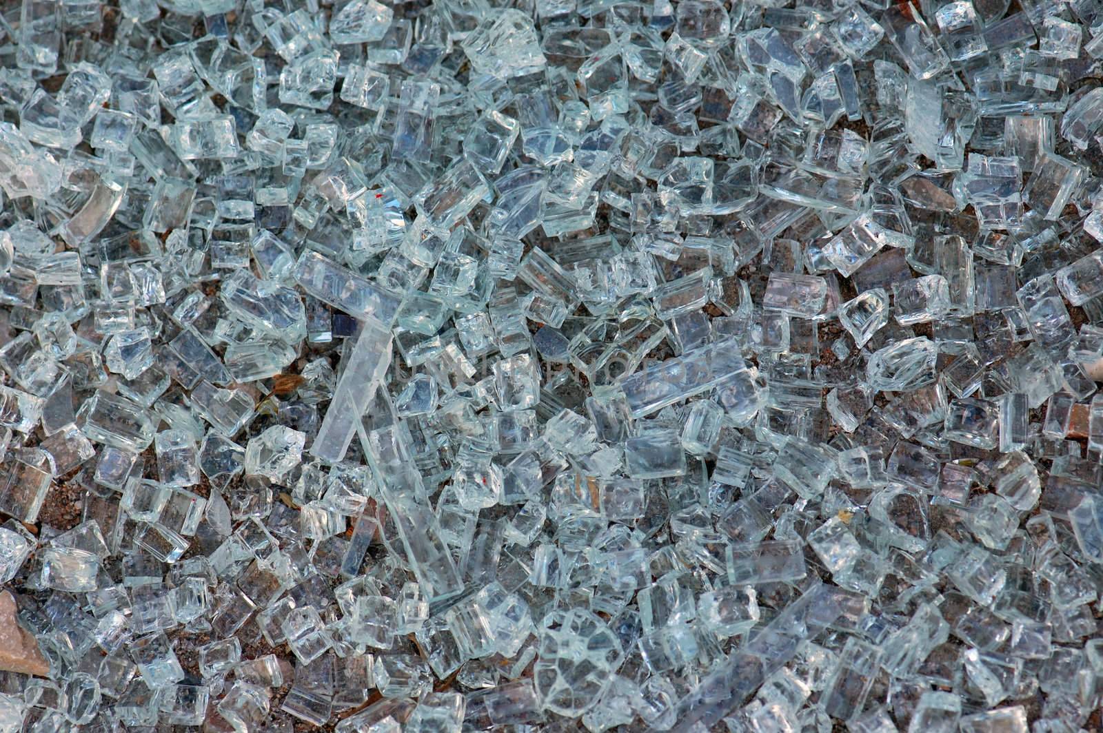 Shattered glass background texture. Pieces of smashed windscreen.