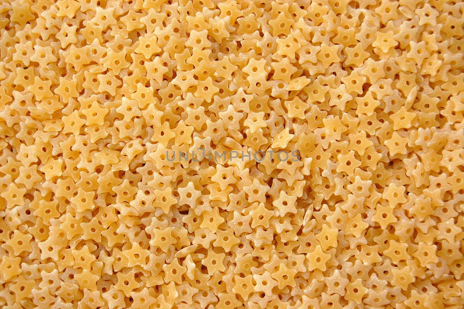 Stellette stars soup pasta. Italian food background.