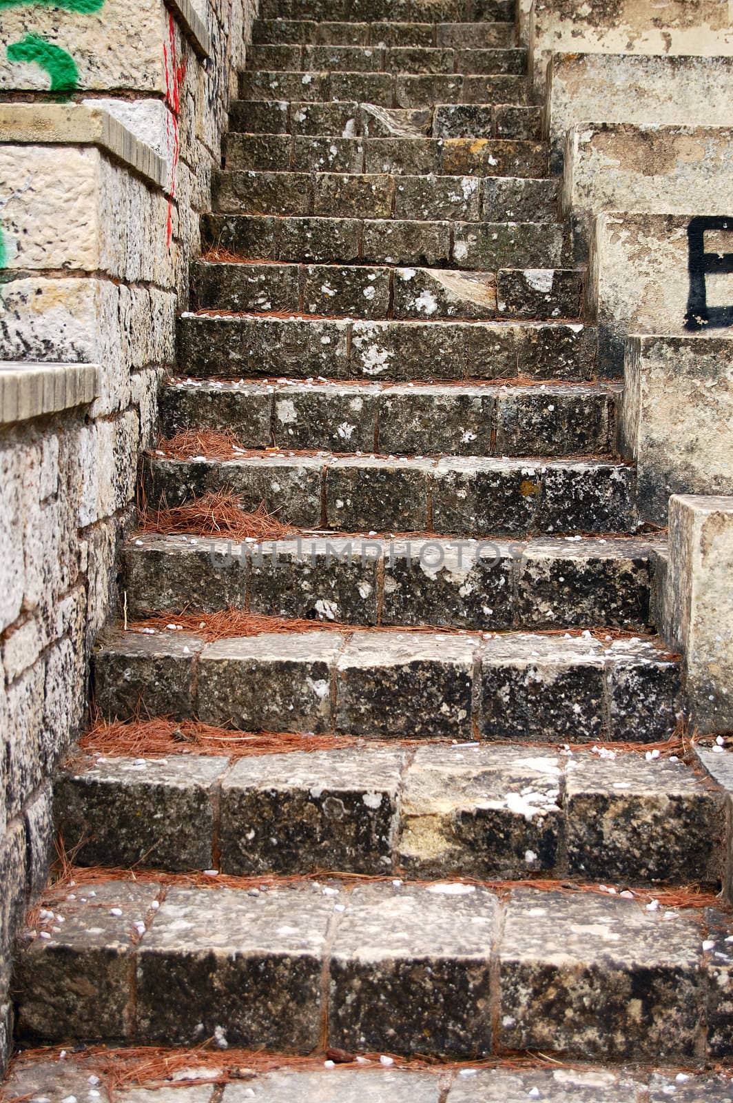 Weathered amphitheatre stone stairway. Abstract background texture.
