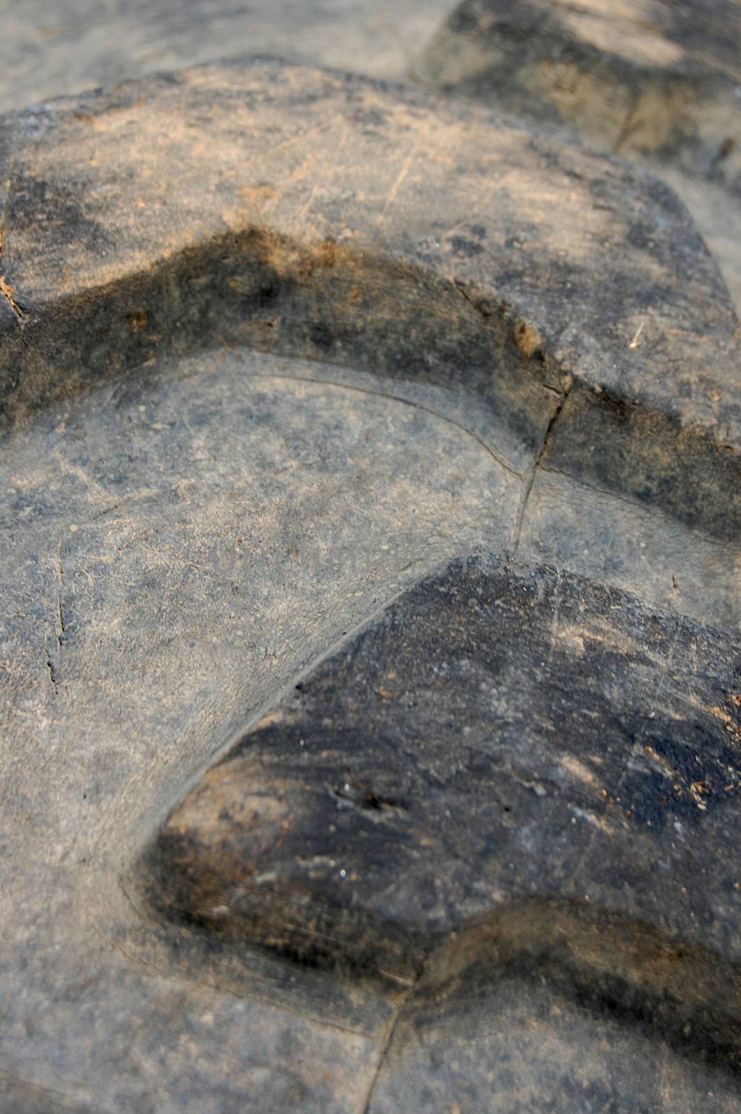 macro view of a tractor's rubber tires