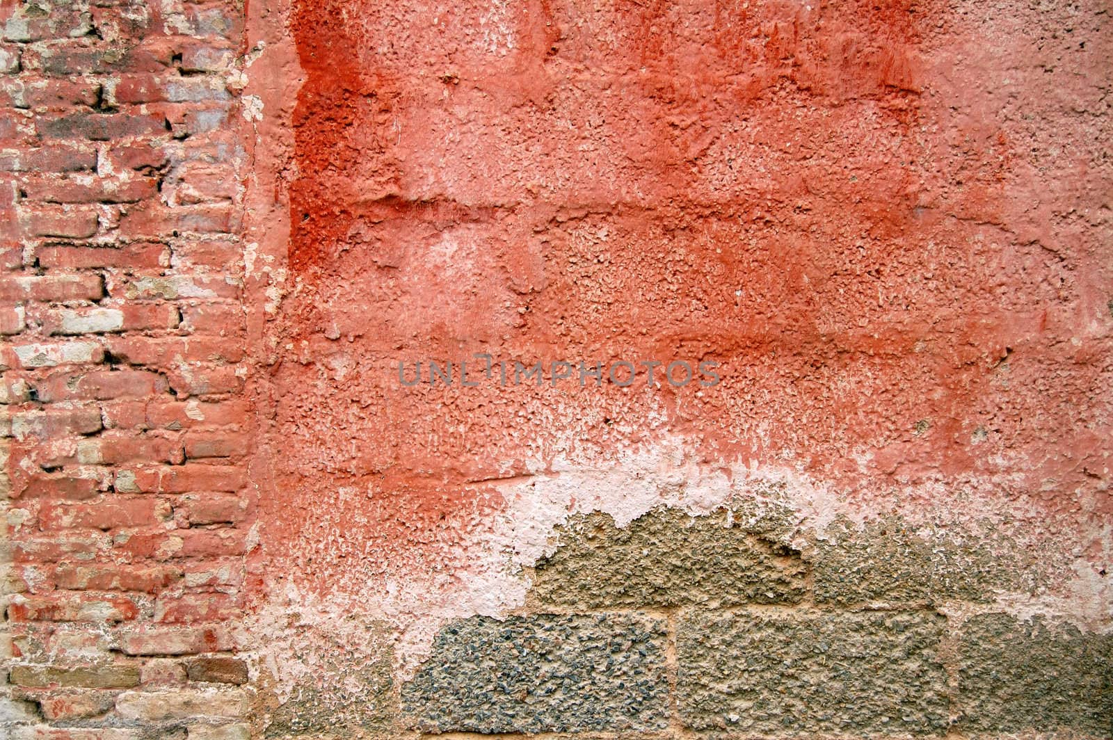 Weathered red wall texture. Grungy peeling paint background pattern.