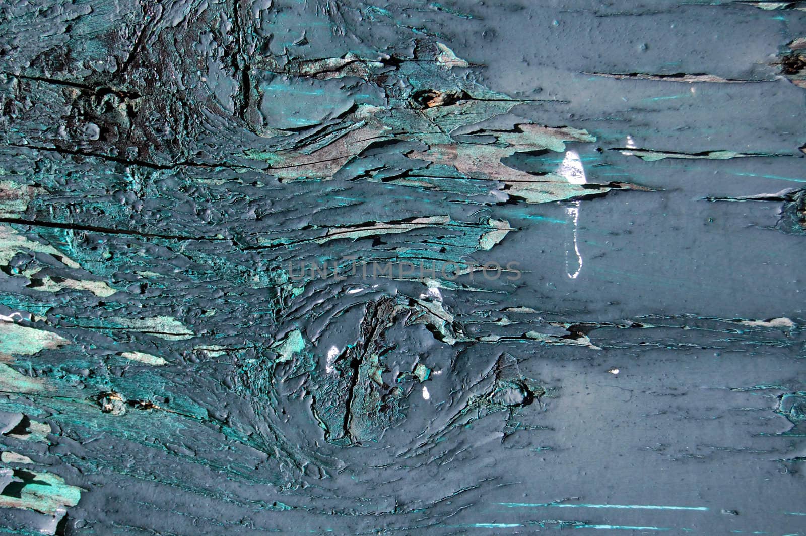 Old wood plank surface detail. Peeling paint texture. Abstract background.
