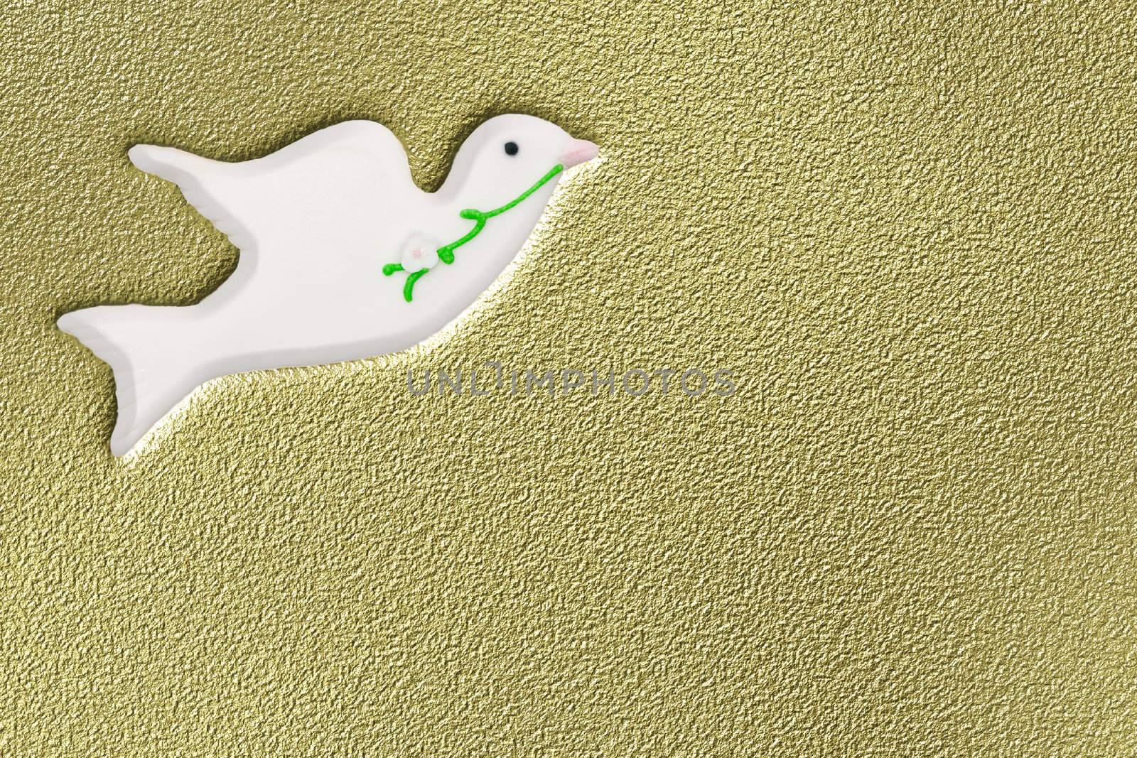 dove of peace on gold background 