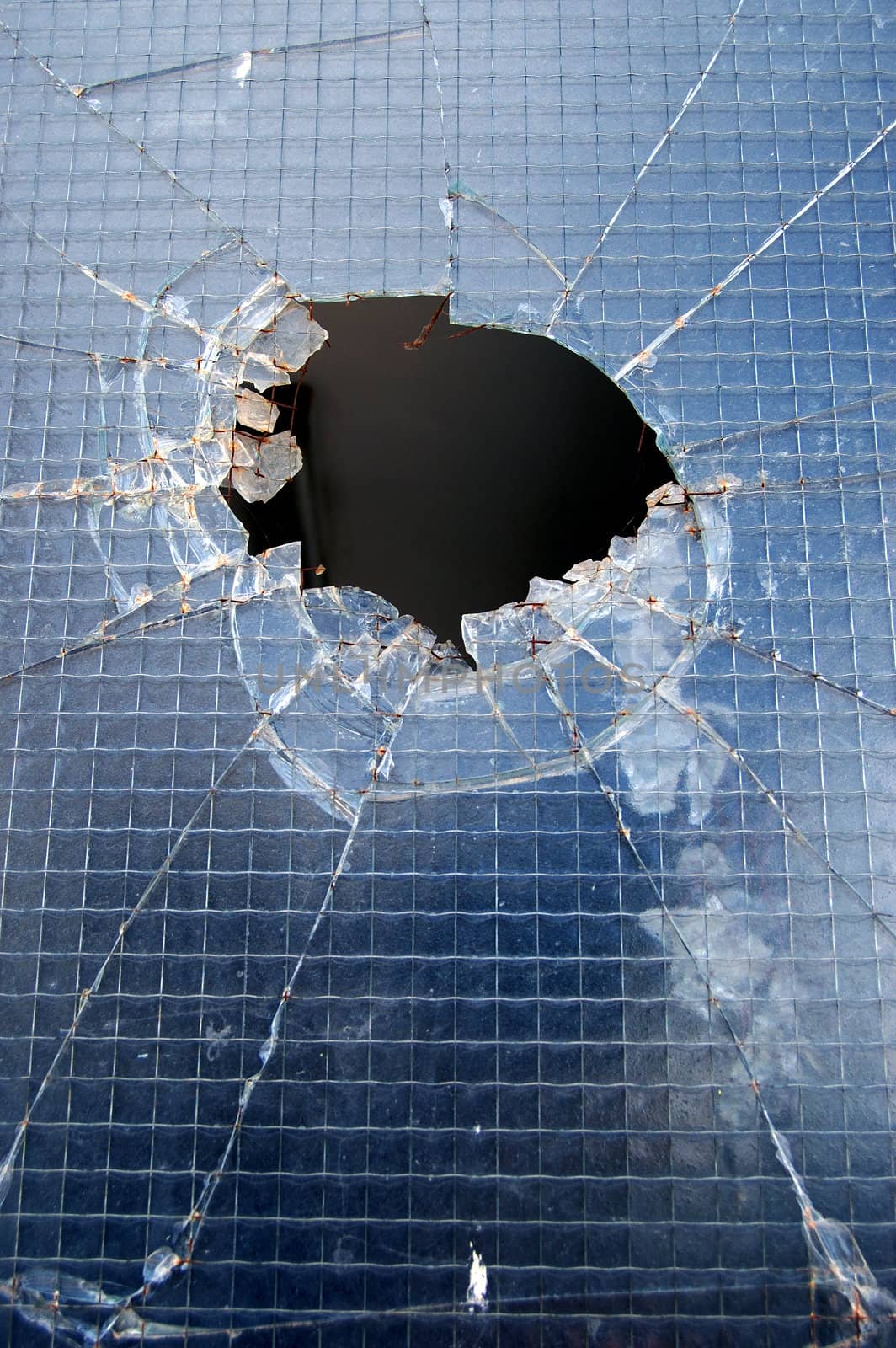 Broken glass surface detail. Abstract background texture.