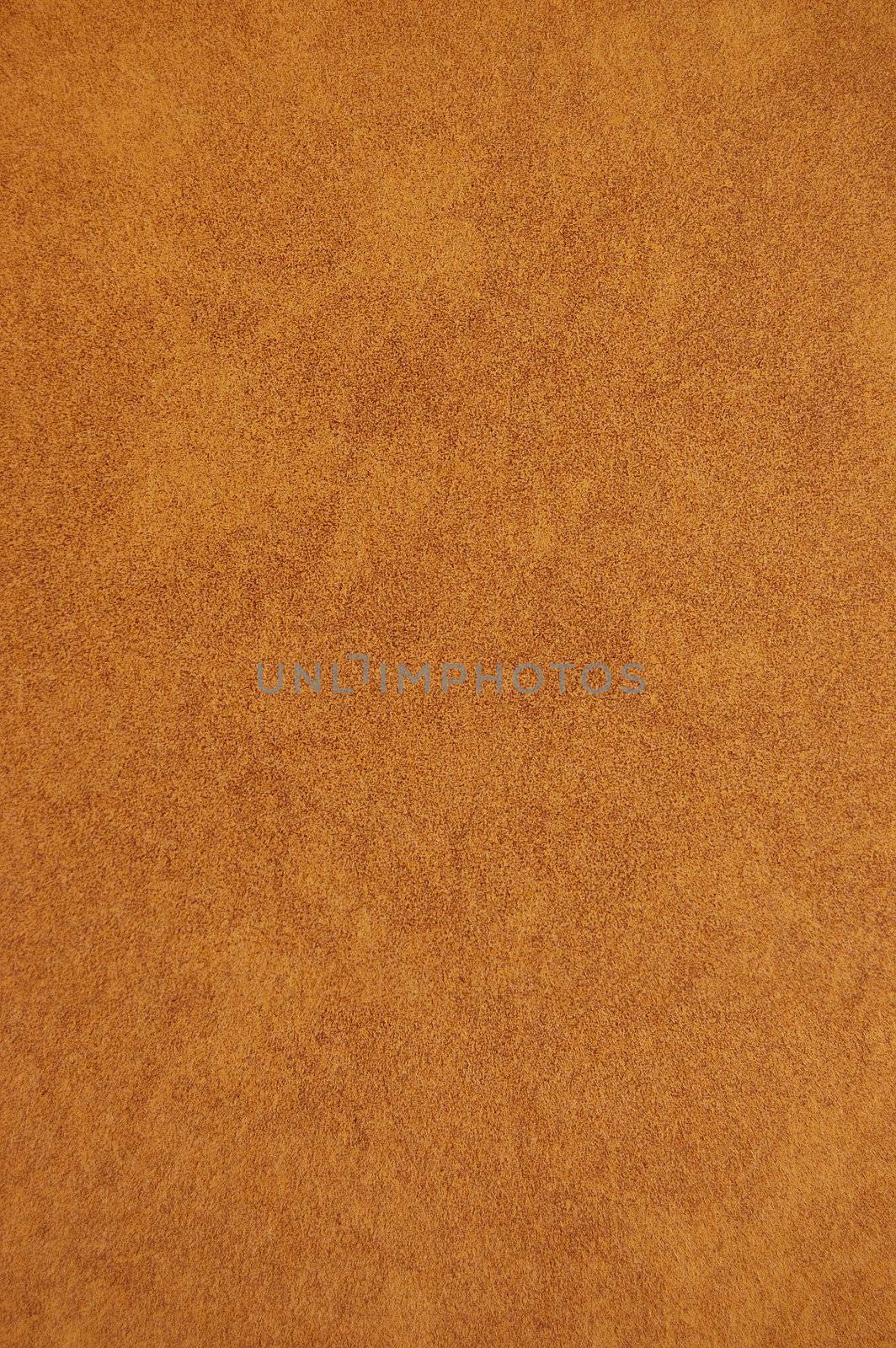 Brown recycled speckled cardboard paper detail. Background texture.