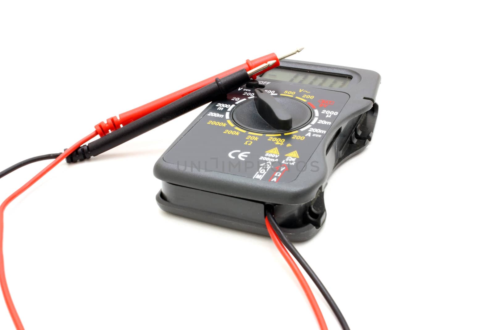 Multimeter of black color with a red and black wire on a white background