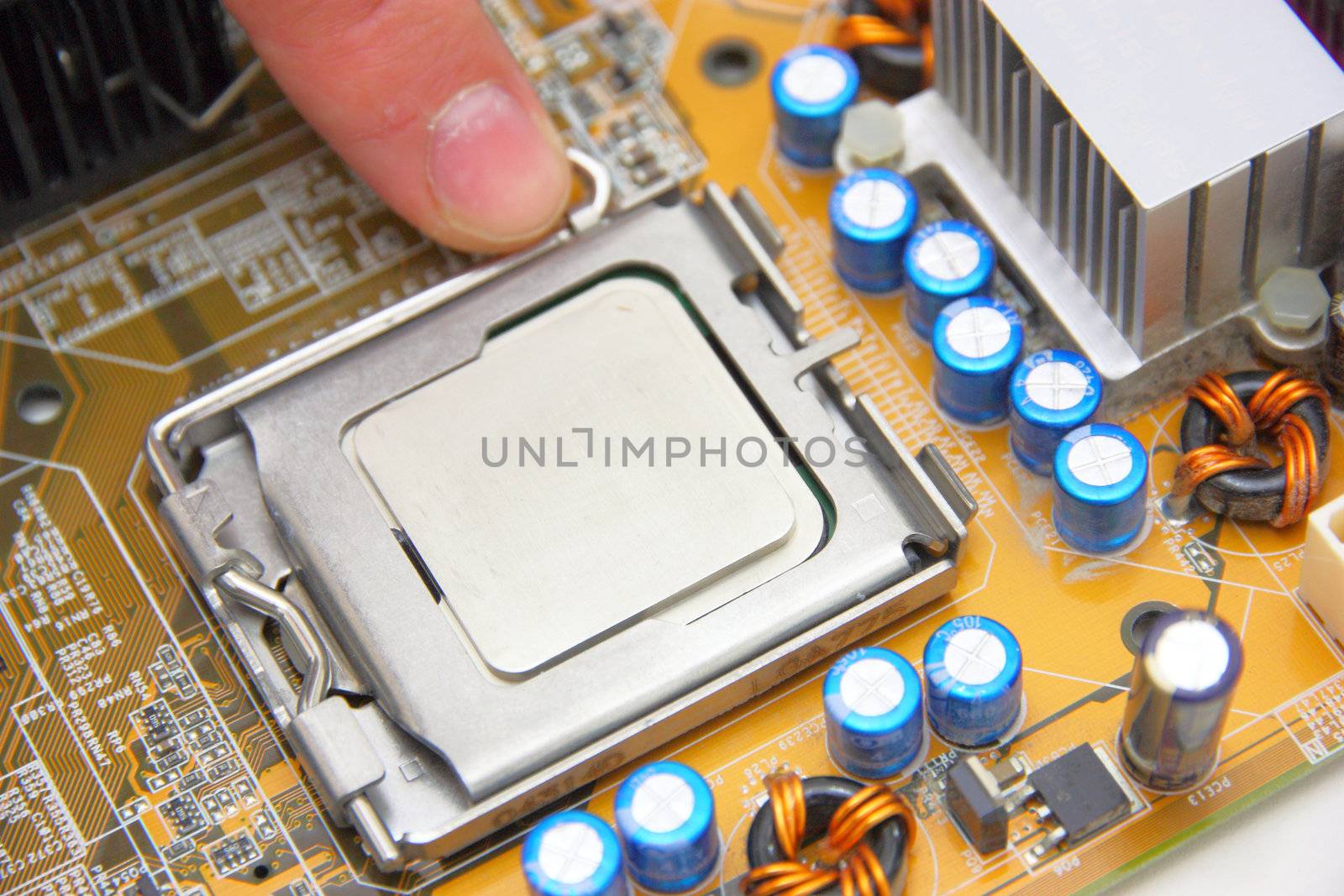 Processor on the yellow computer motherboard