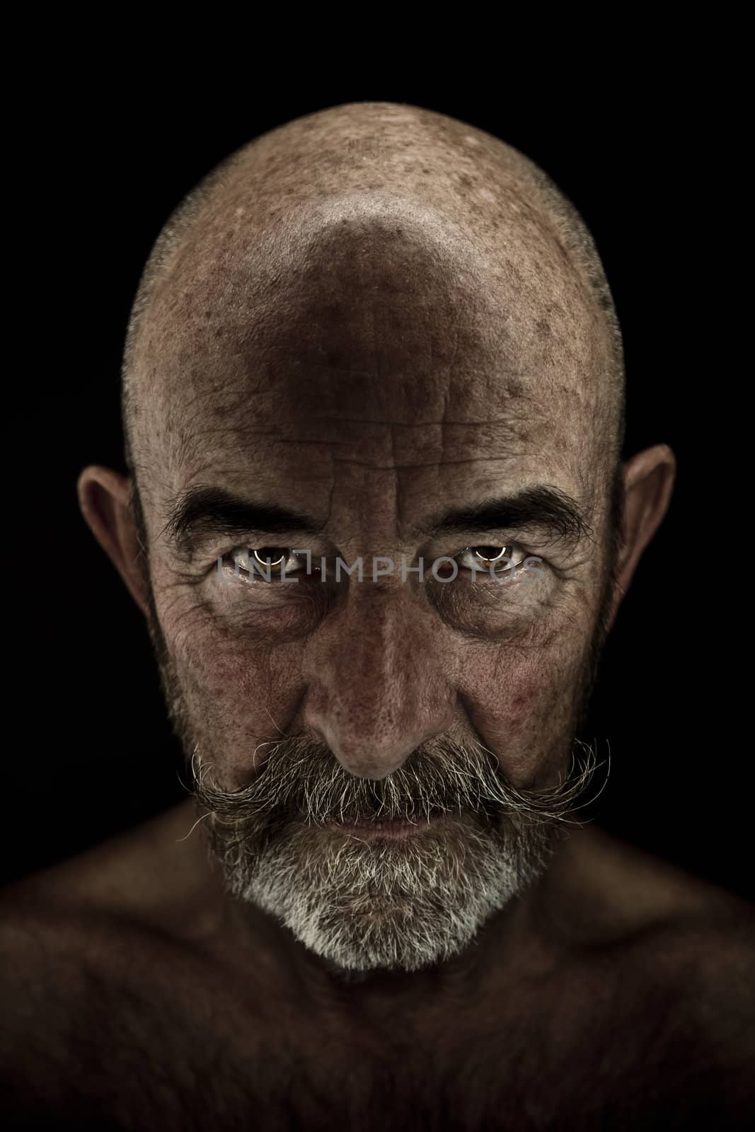 A strange old man with a grey beard
