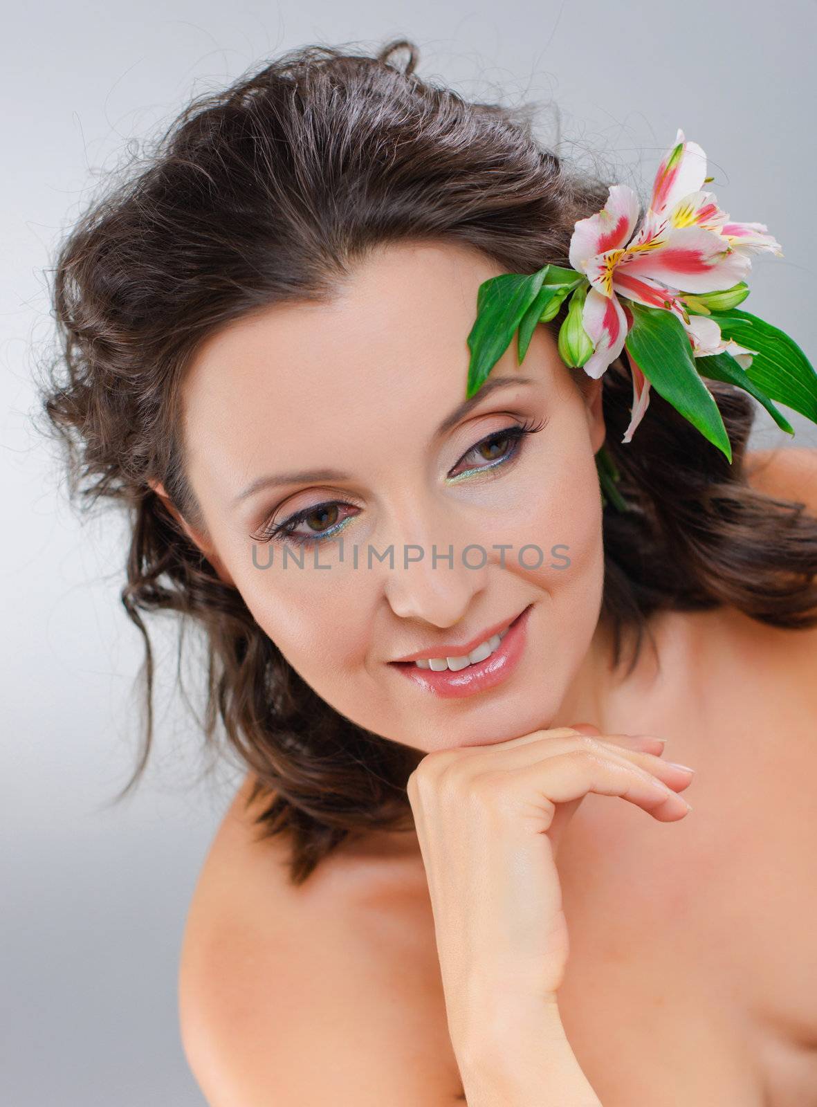 Close-up of woman green eye with Pink flowers