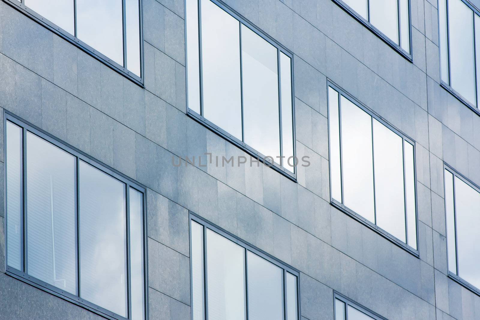 Facade of office building in blue atmosphere