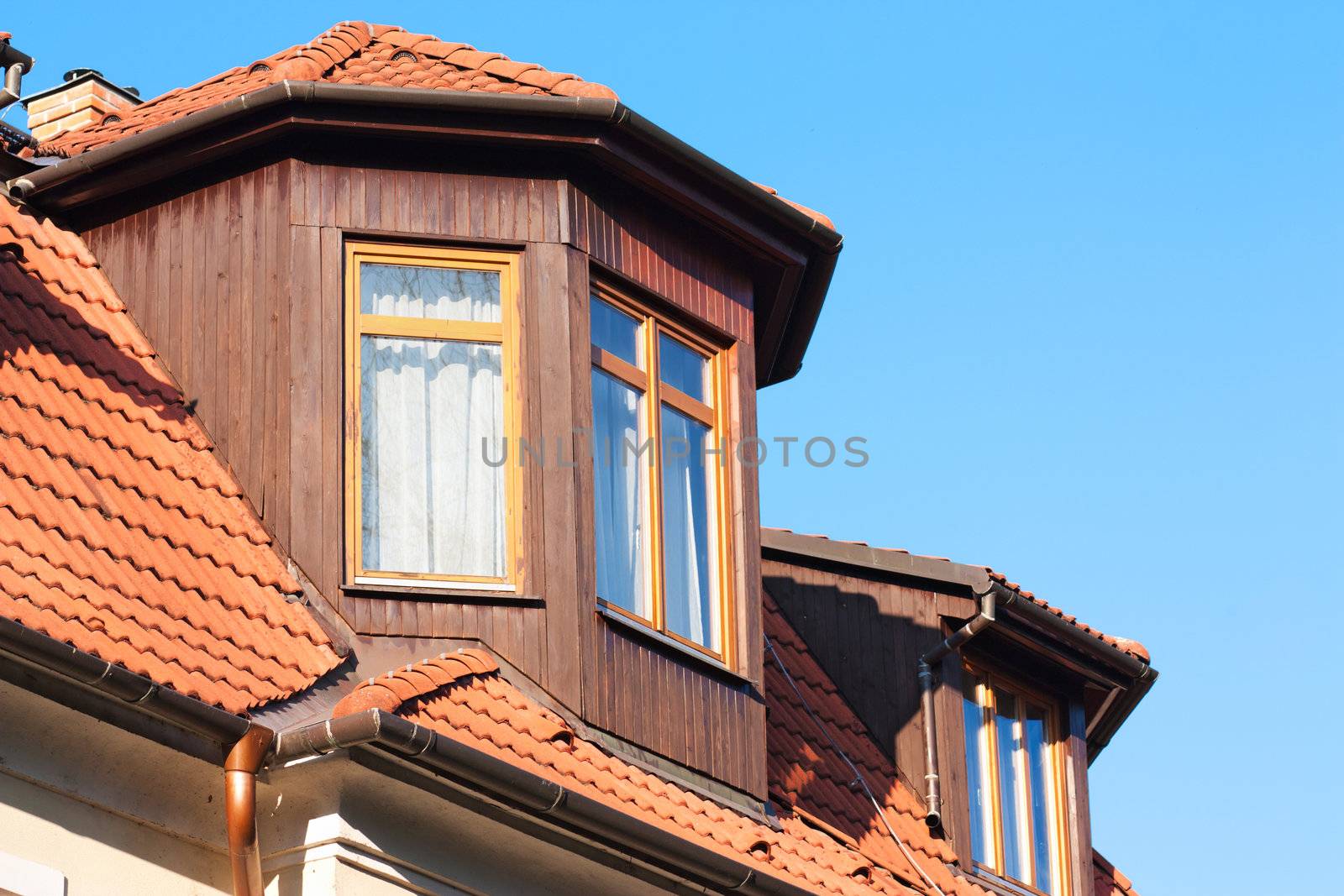 Tiled roof and wooden windows