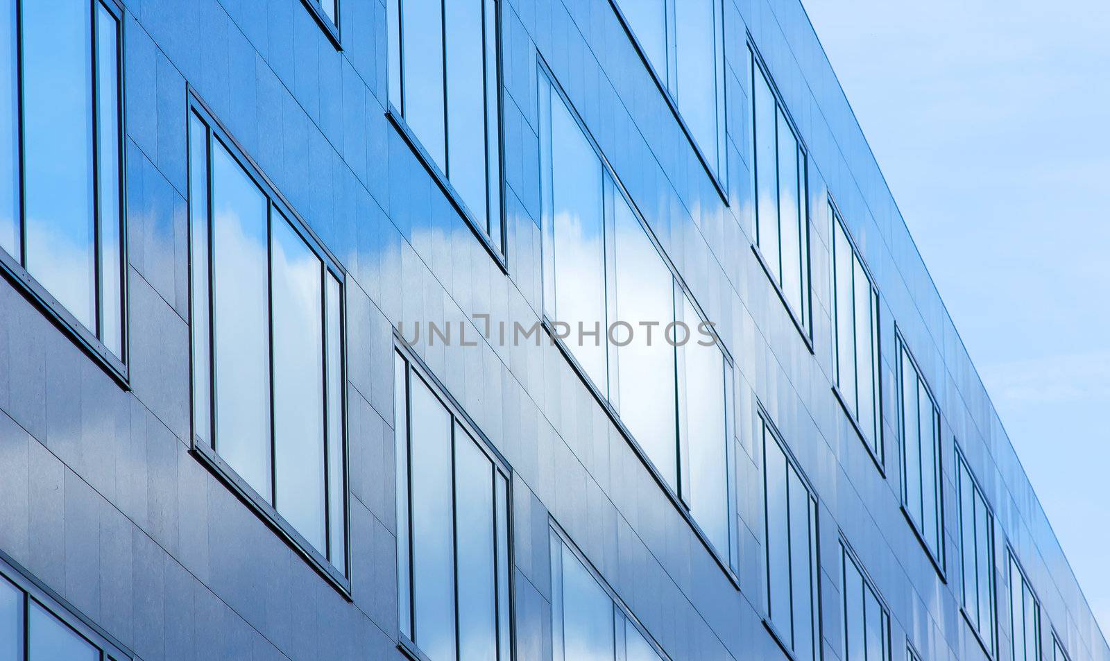 Facade of office building in blue atmosphere