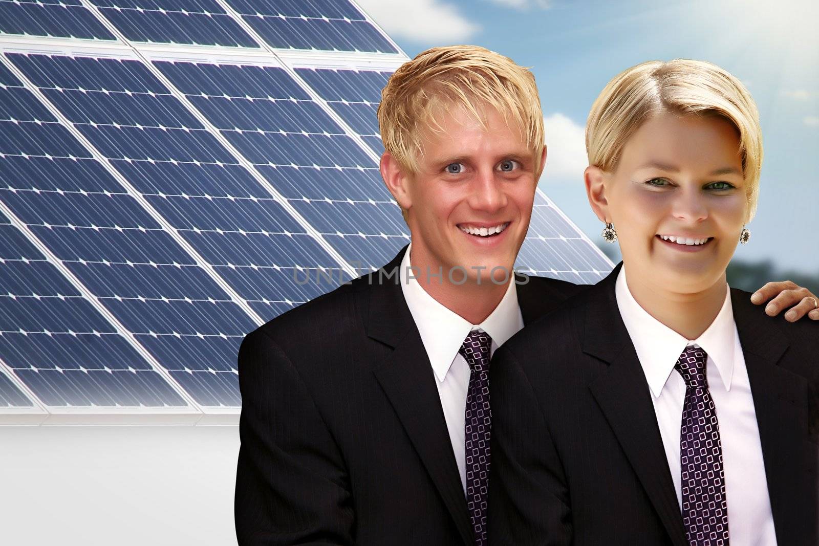 young couple in front of their solar roof