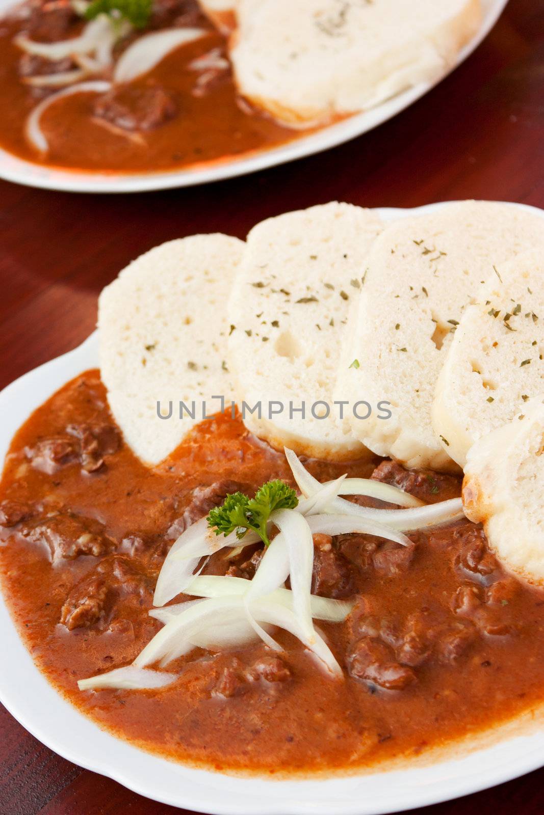 Beef goulash and dumplings (knedliky) from Czech Republic