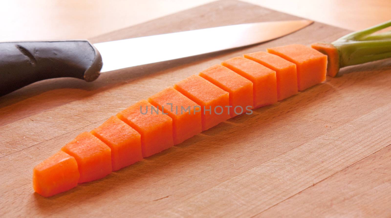 Carrot cut and re-form, knife and plank