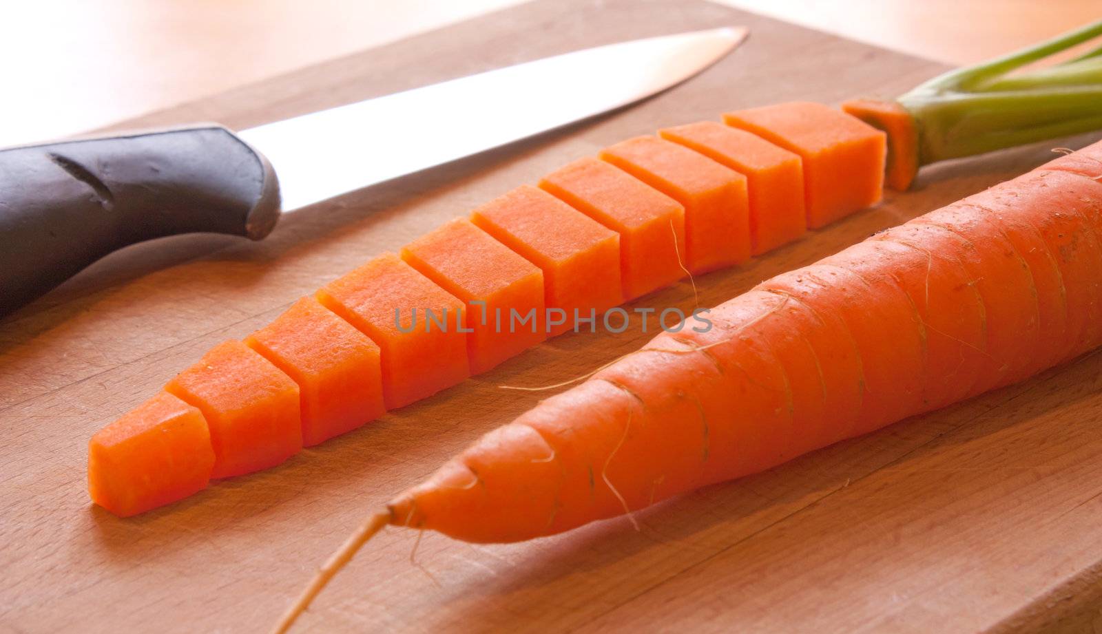 Carrot cut and re-form, knife and plank