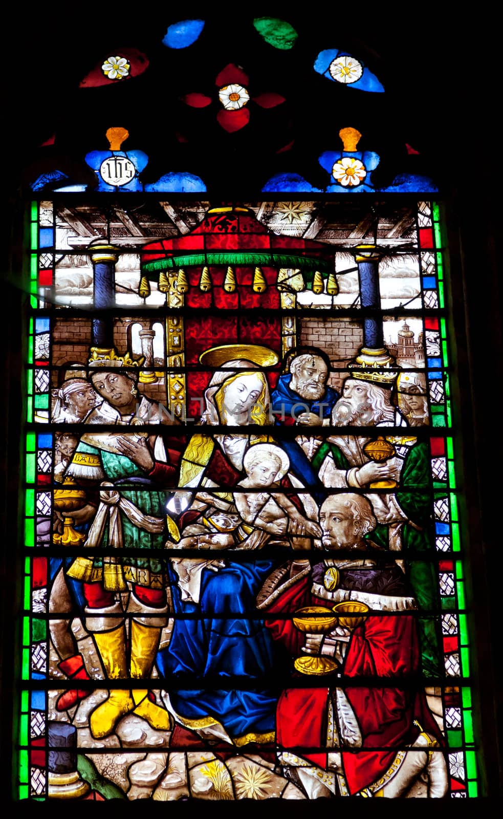 Wonderful ancient stained glass window formed of multiple colors