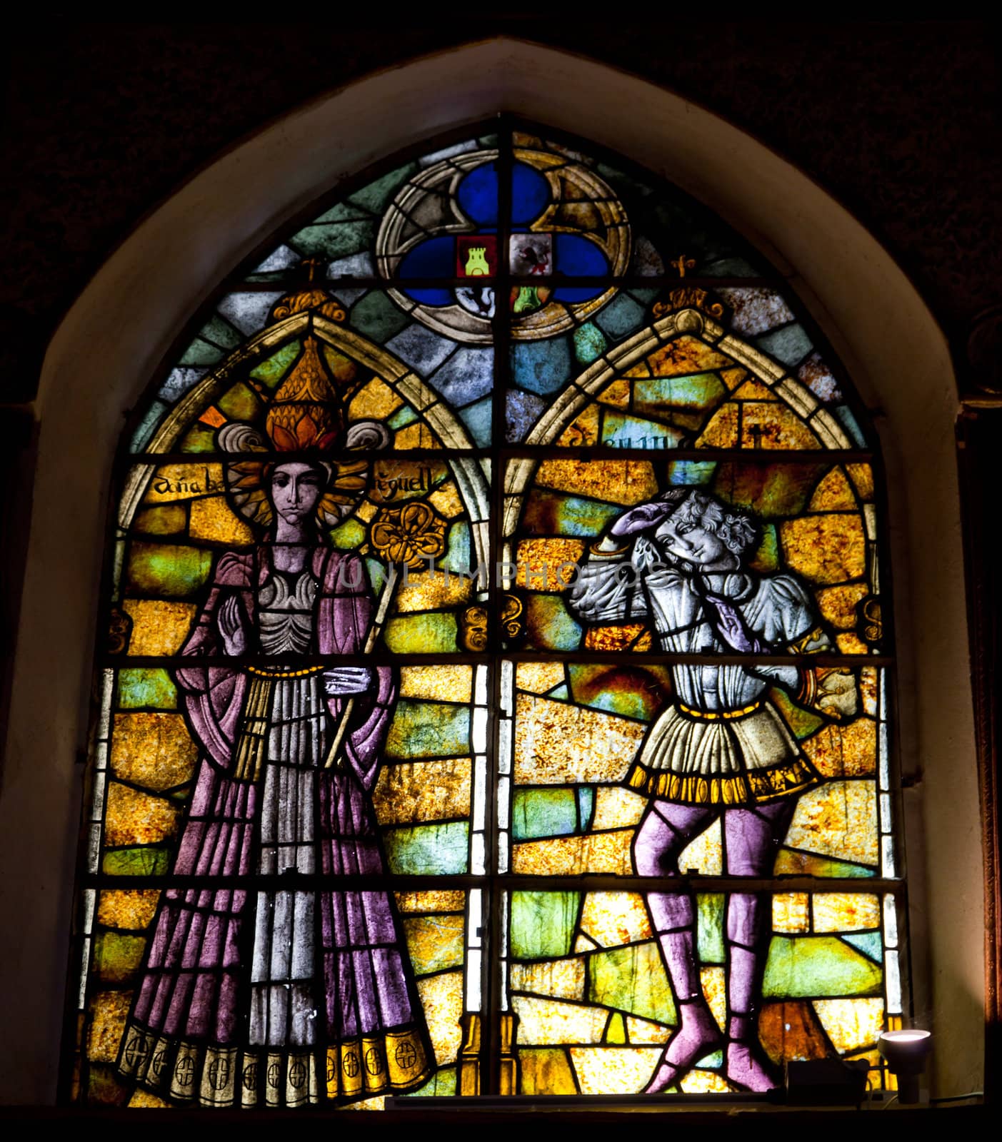 Wonderful ancient stained glass window formed of multiple colors
