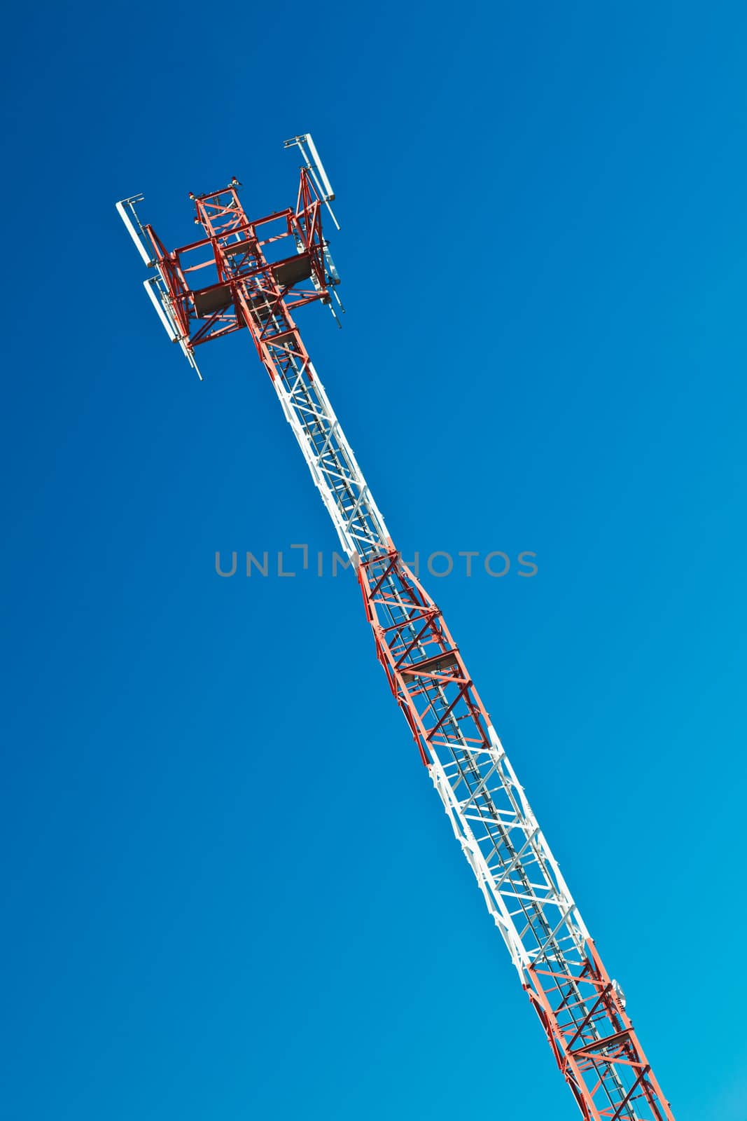 Communications tower with a beautiful blue sky