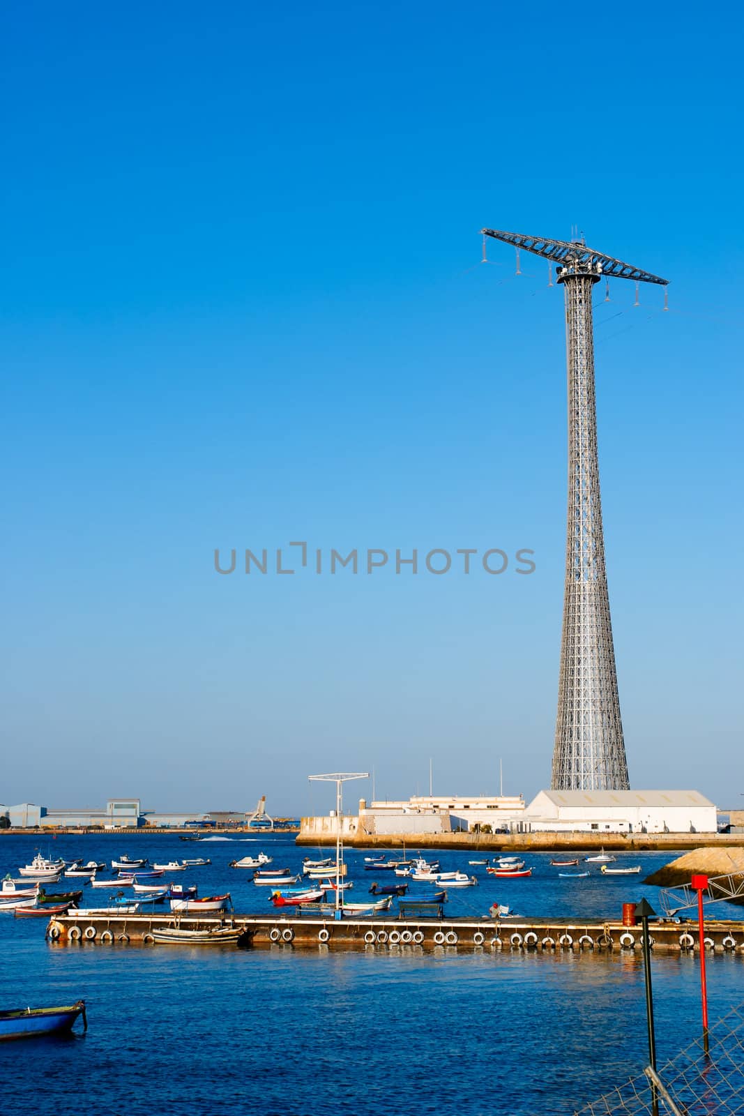 Communications tower with a beautiful blue sky