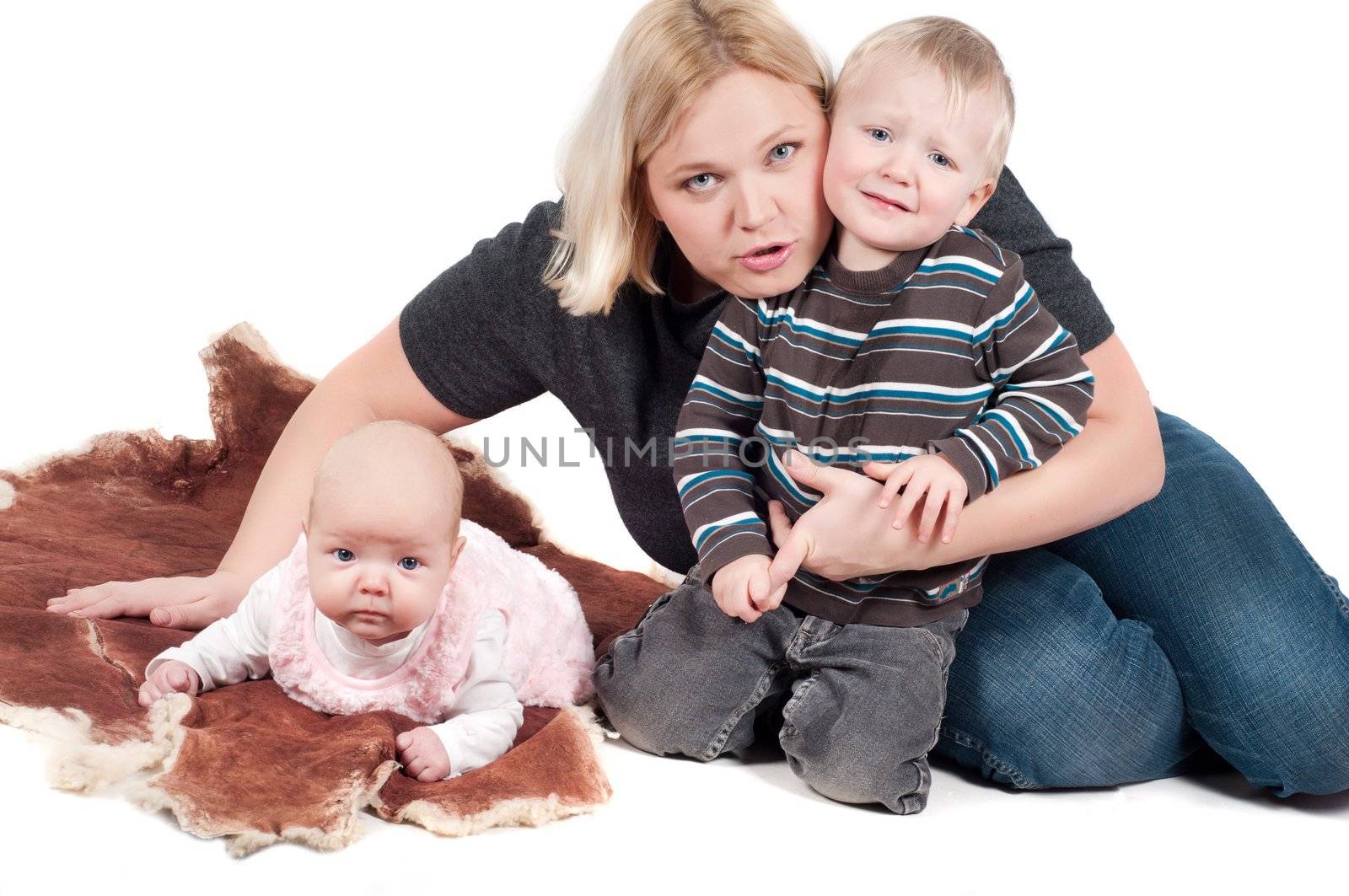 Shot of cute family: mother, sun and daughter