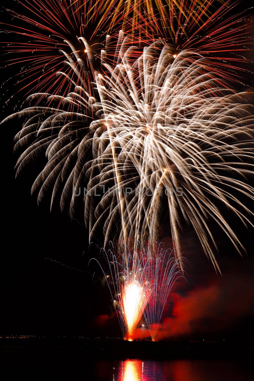 Firework streaks in the night sky