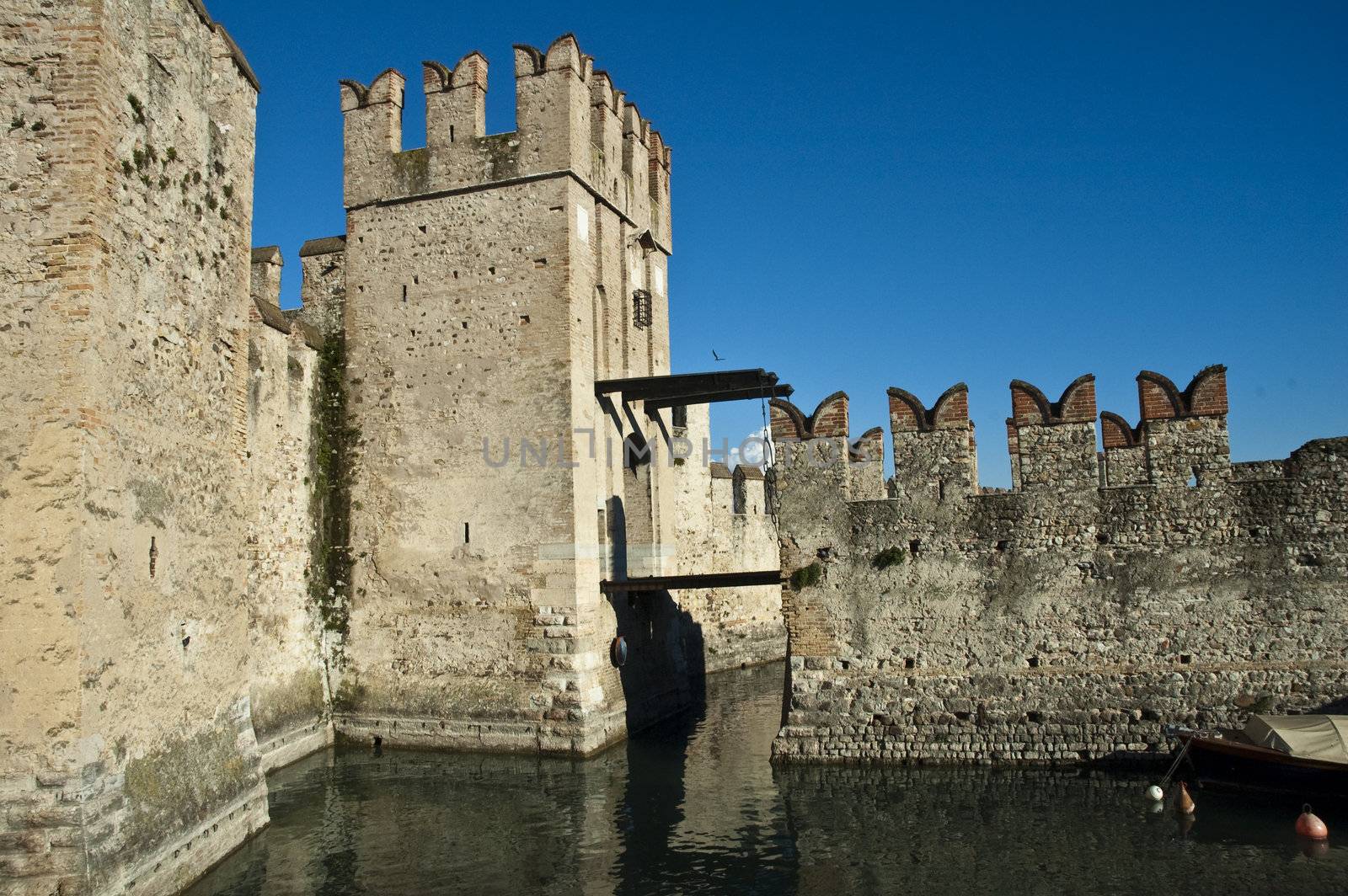 an ancient fortress on an Italian lake