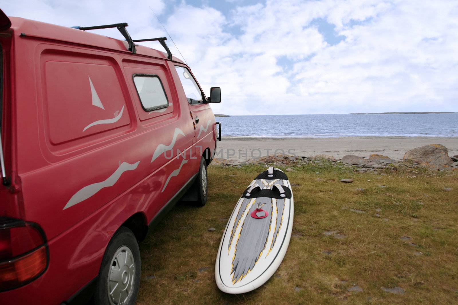a van and windsurf equipment on the beach in the maharees county kerry ireland
