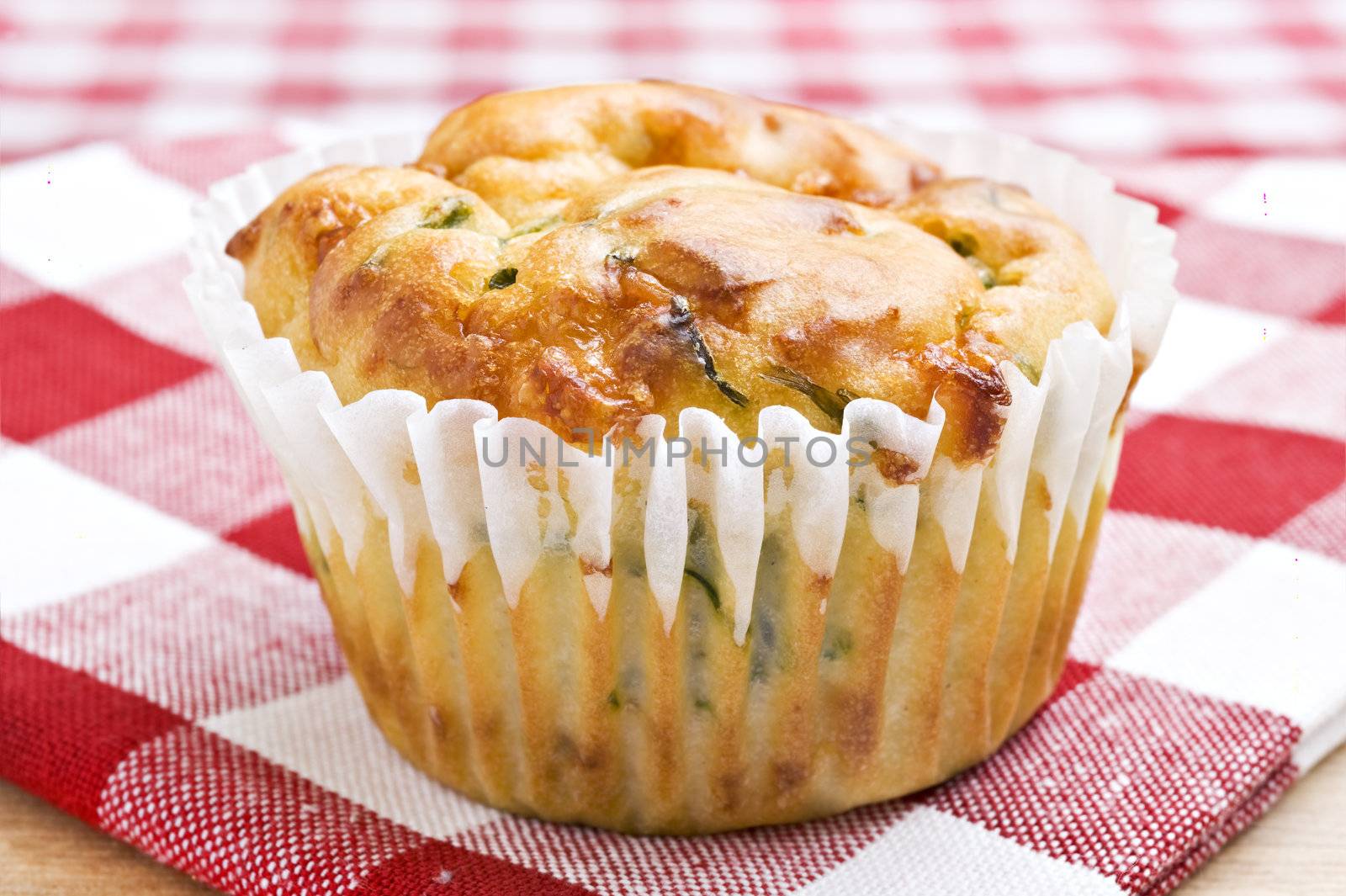 Freshly baked spinach and cheese muffins ready to be served by tish1