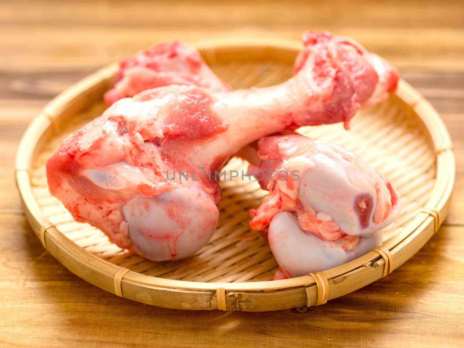 close up of pork bones in basket