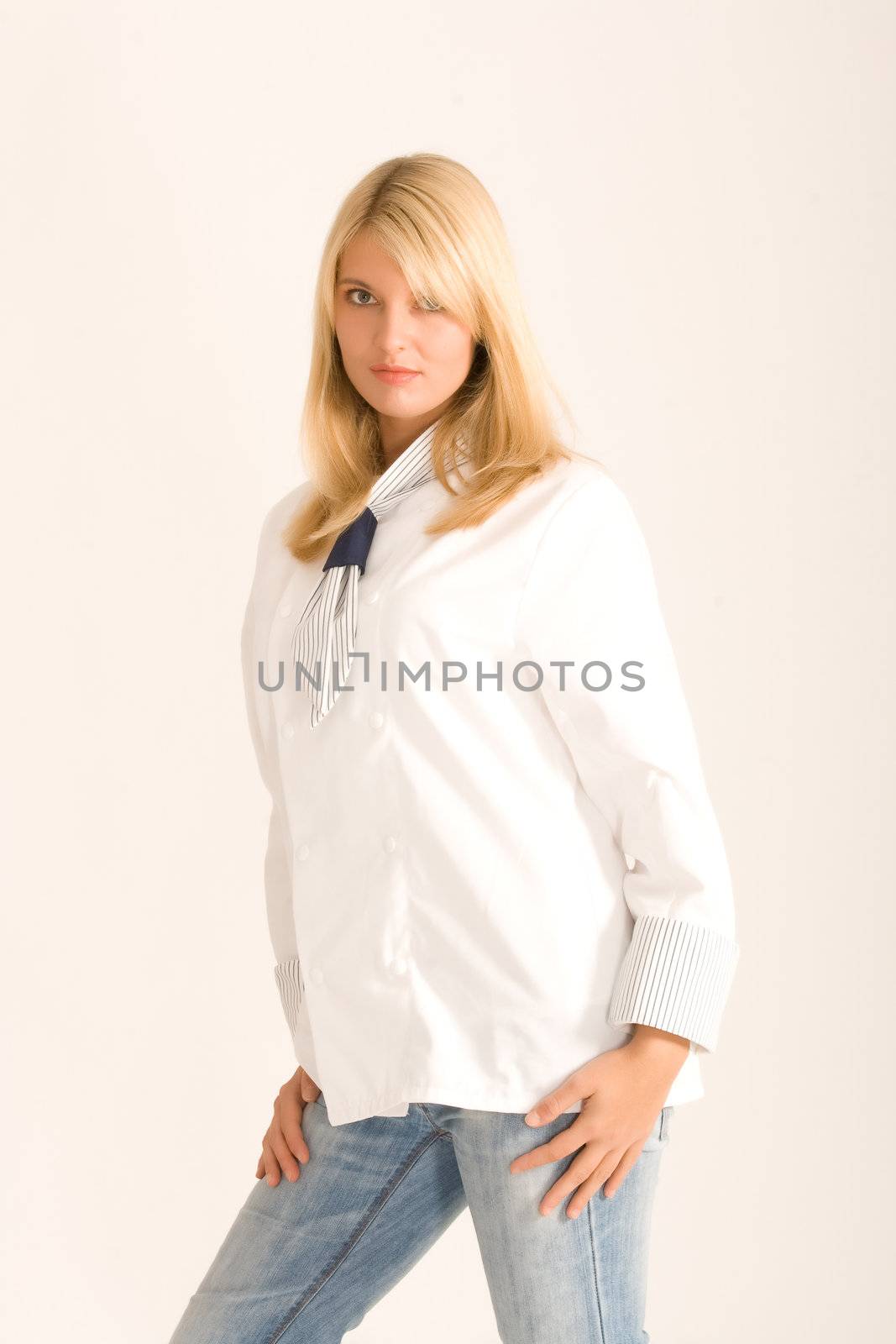 Blonde cook in a trendy white workwear