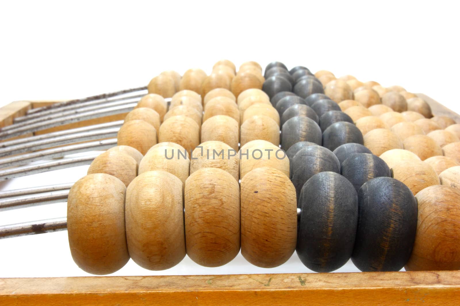 Accounting abacus for financial calculations lies on a white background