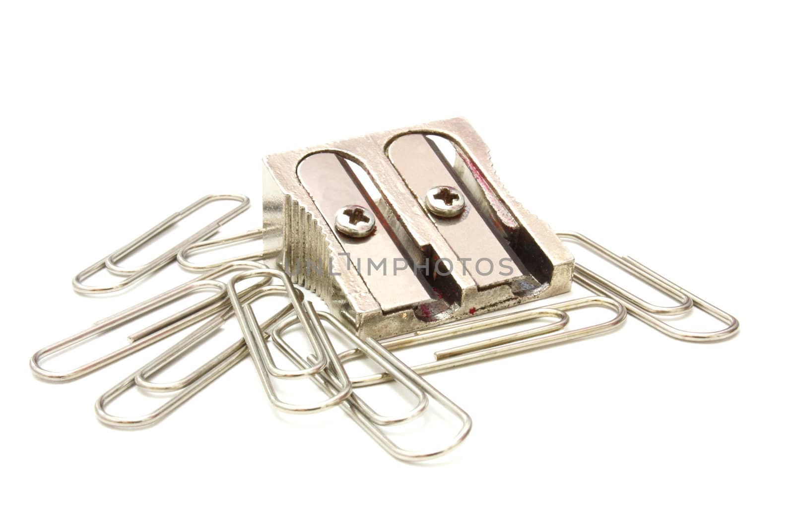 shot of eraser, pencil and pencil metal double sharpener on a white background
