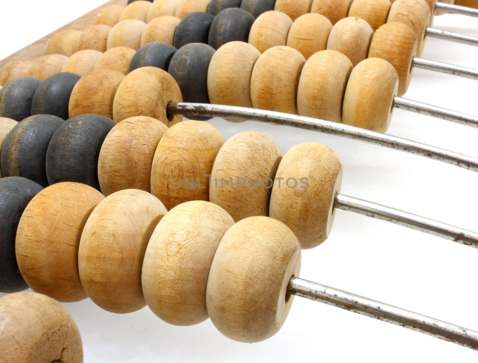 Accounting abacus for financial calculations lies on a white background