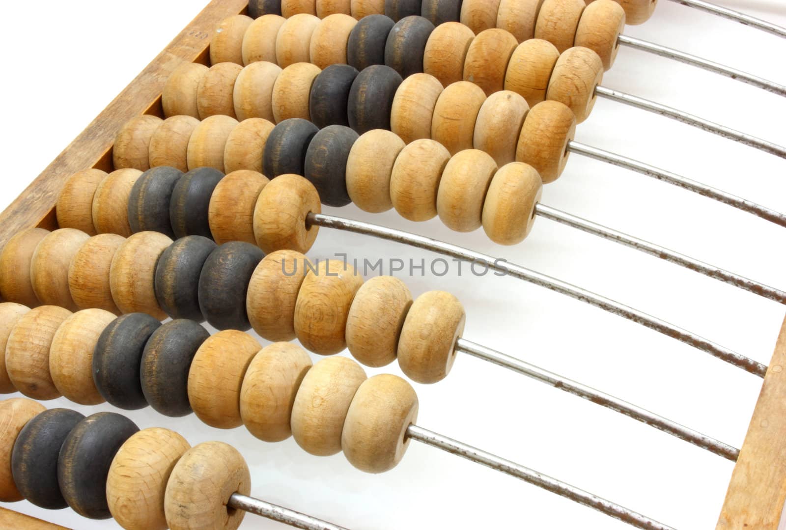 Accounting abacus for financial calculations lies on a white background