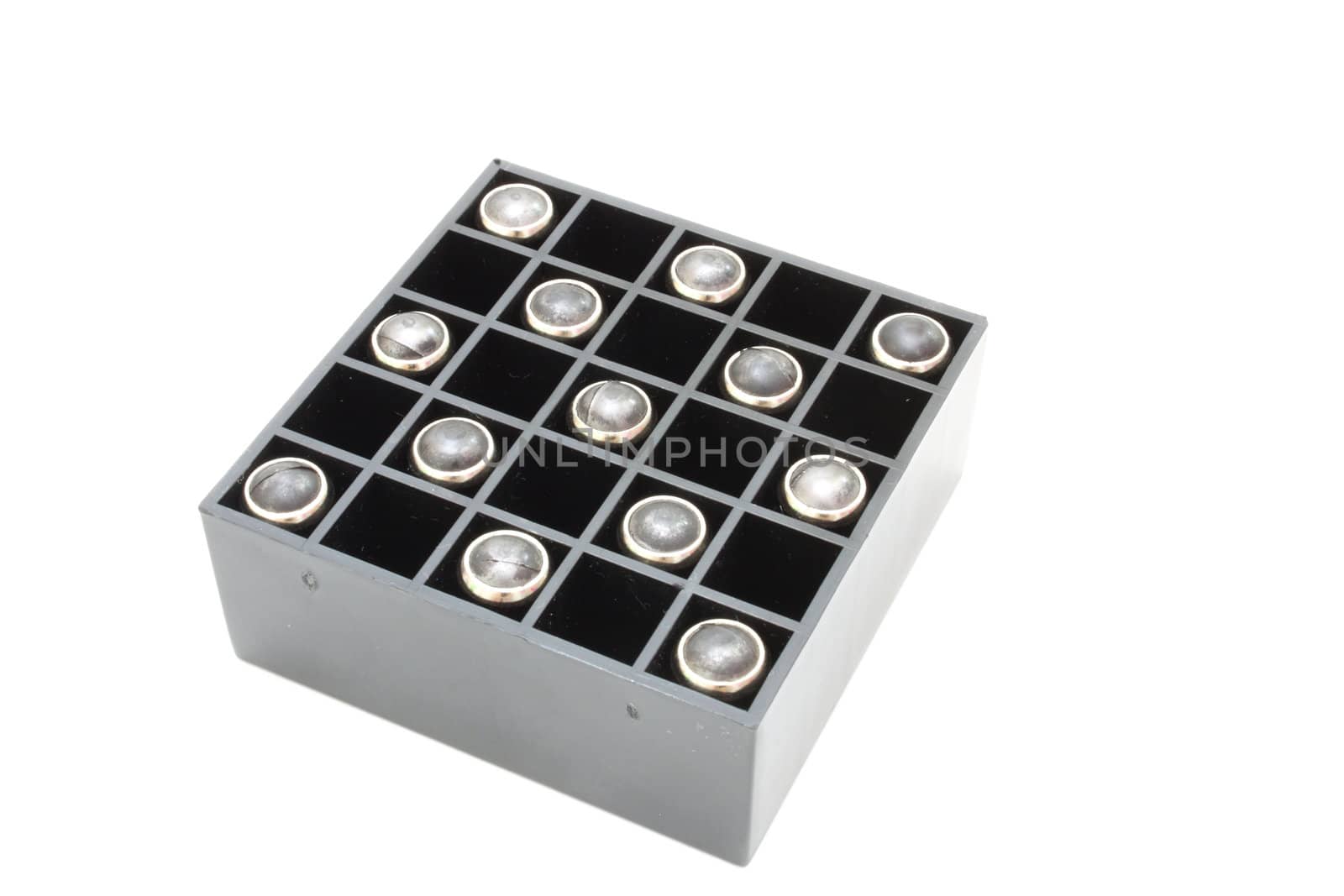 Pistol cartridges with a rubber bullet lie in packing of black color.
