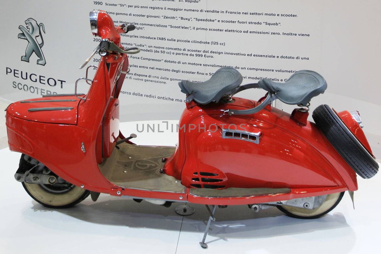 Special vintage Peugeot motorcycle in exhibition at EICMA, International Motorcycle Exhibition in Milan, Italy.