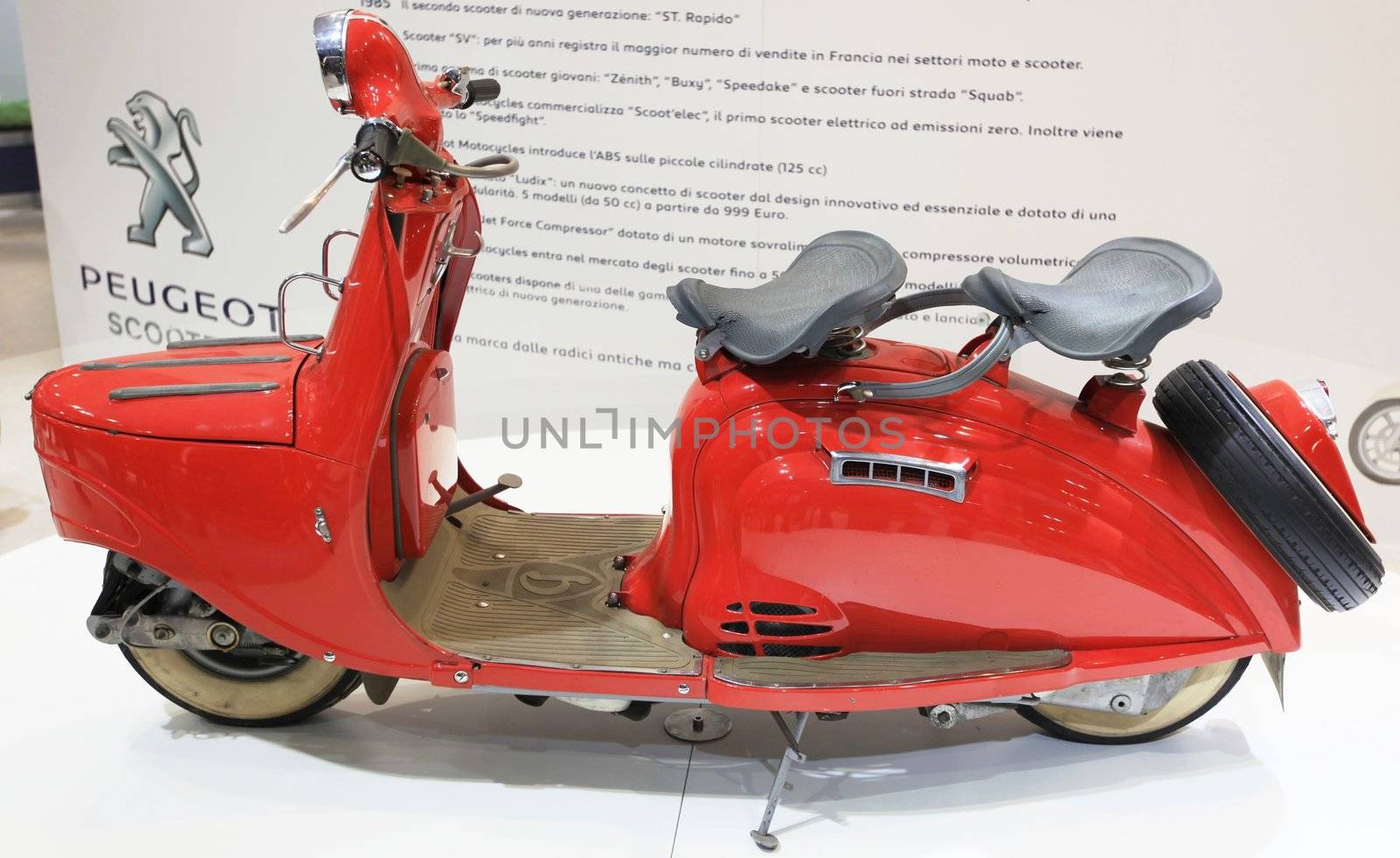 Special vintage Peugeot motorcycle in exhibition at EICMA, International Motorcycle Exhibition in Milan, Italy.