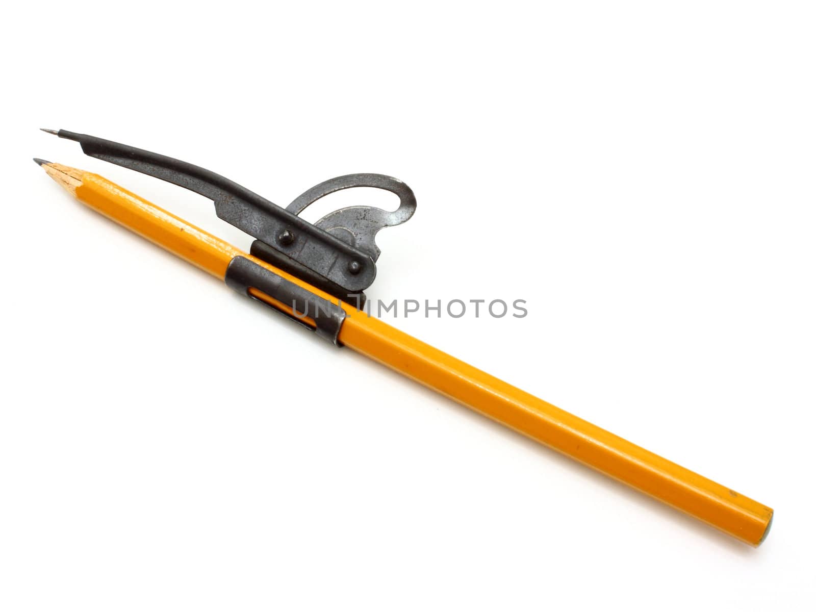 The yellow ground pencil lies is isolated on a snow-white background