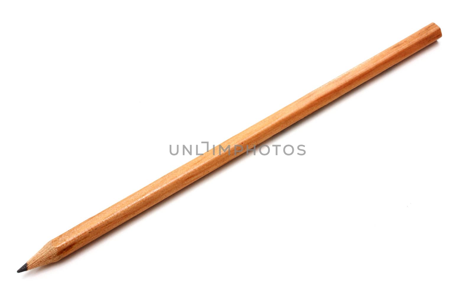 The yellow ground pencil lies is isolated on a snow-white background