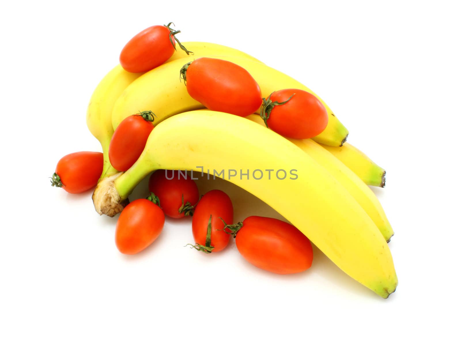 Yellow bananas apples and pears a still-life on a white background