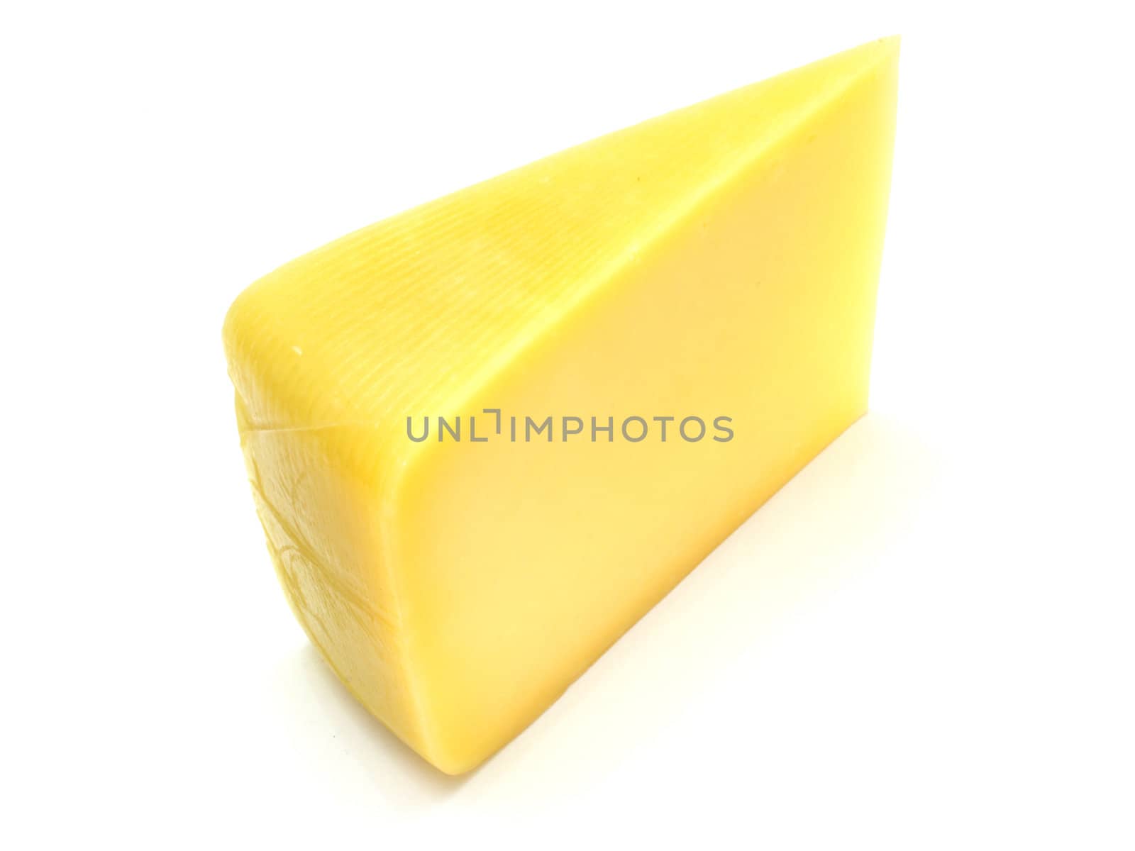 A piece of Swiss cheese isolated on white yellow delicatessen;