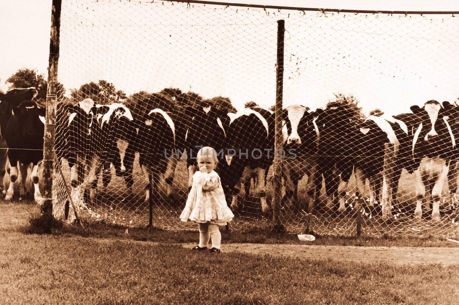 child in front of goal