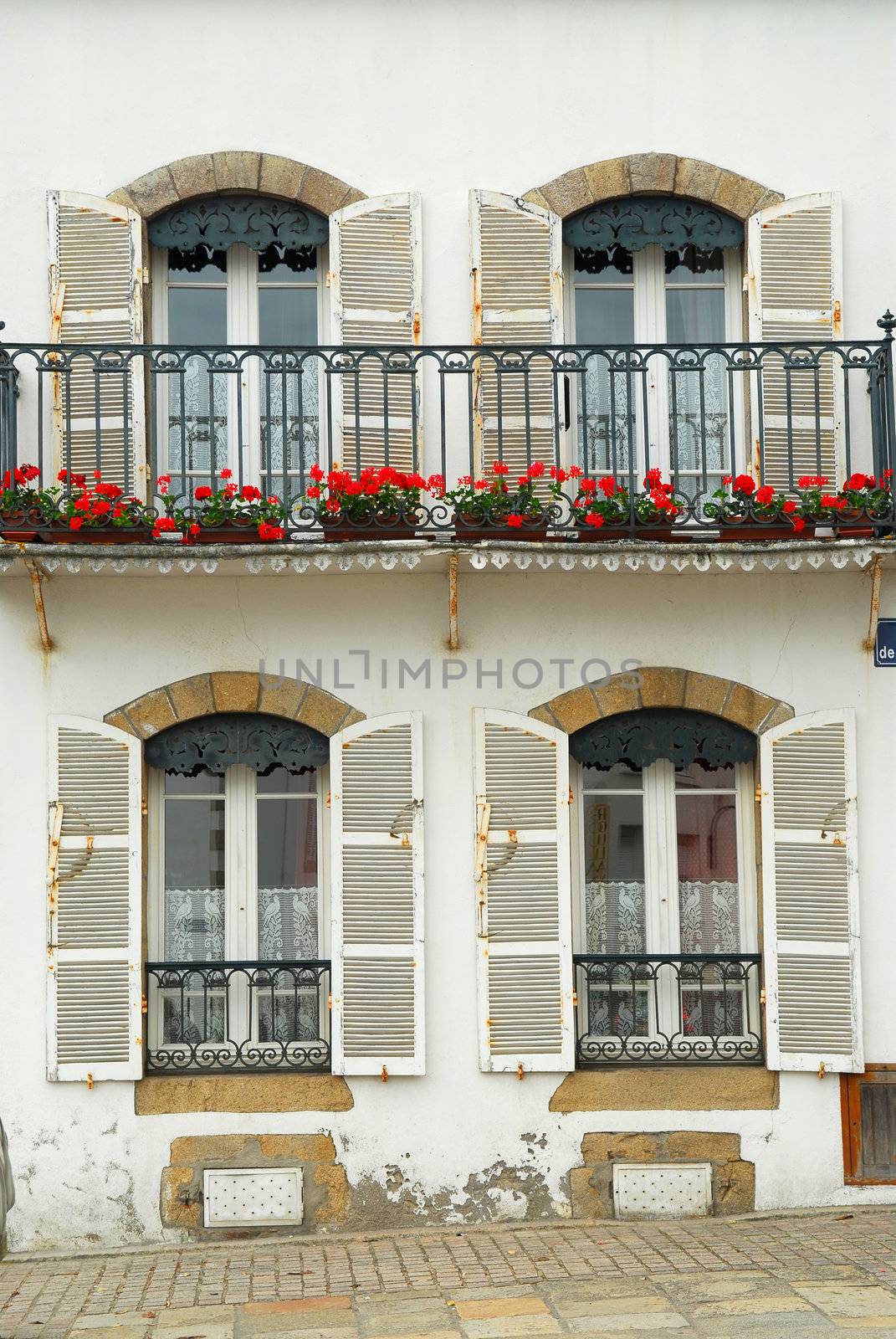 Facade of an old house in town of Carnac, South Brittany, France.