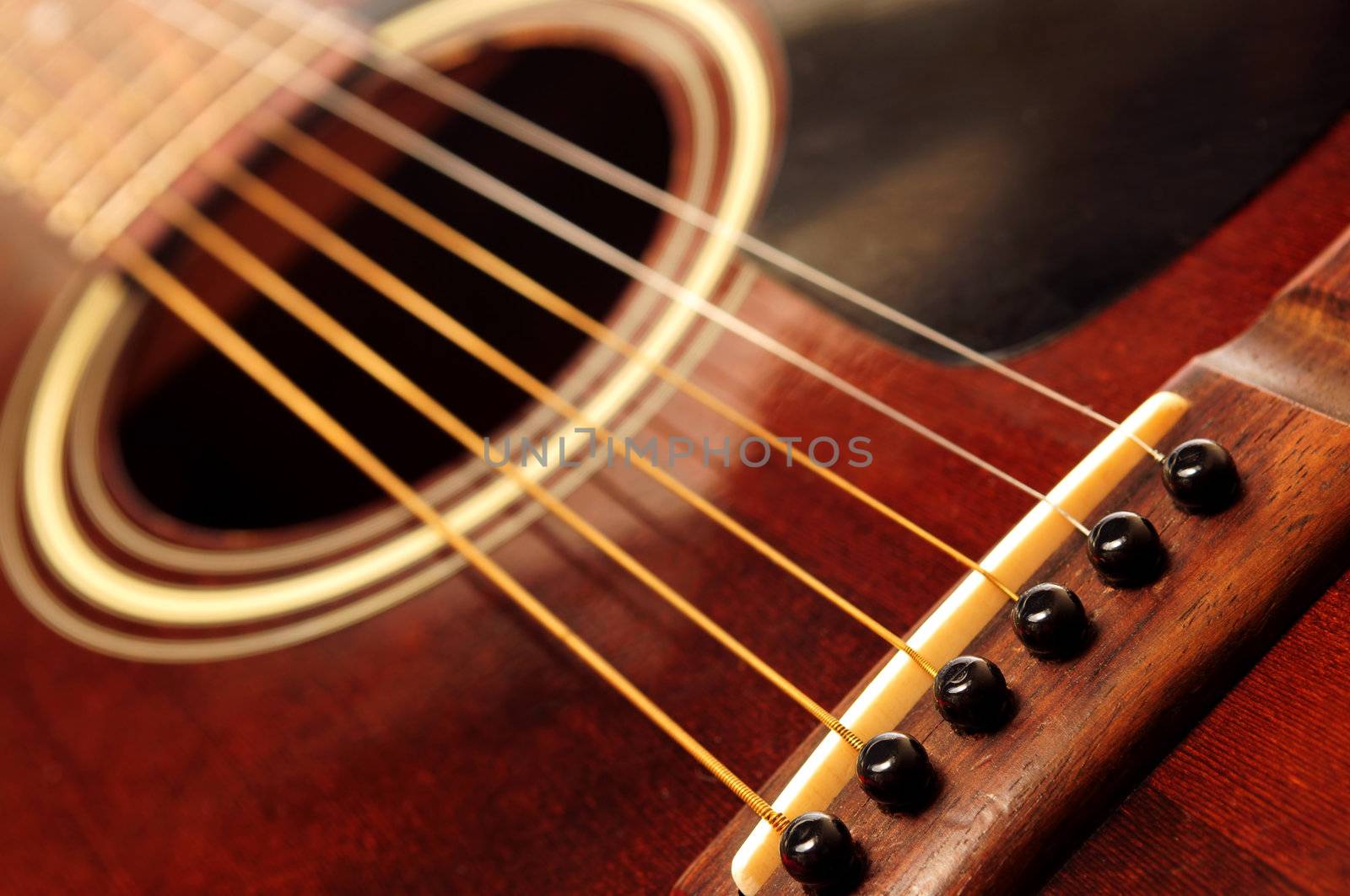 Old guitar close up by elenathewise
