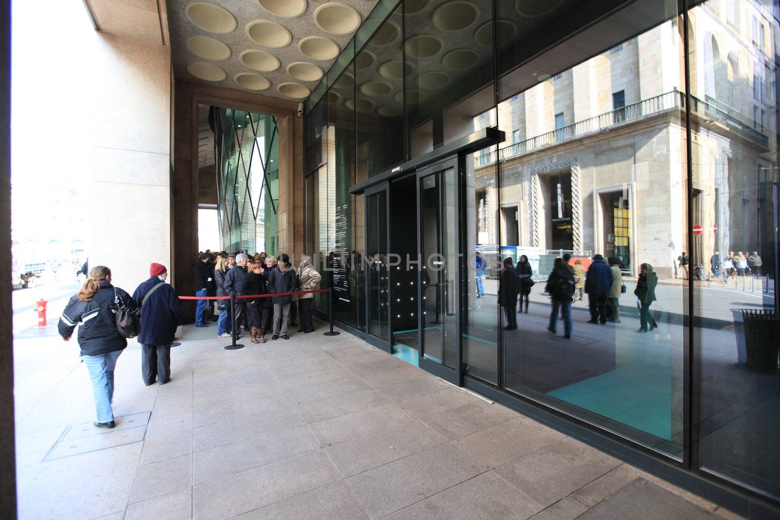 Entering the new Museo del Novecento, hosting Picasso, Cezanne, Fontana, Mondrian works of art in Milan, Italy